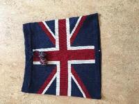 Sukňa s motívom britskej vlajky s brmbolcami