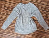 Sivý sveter